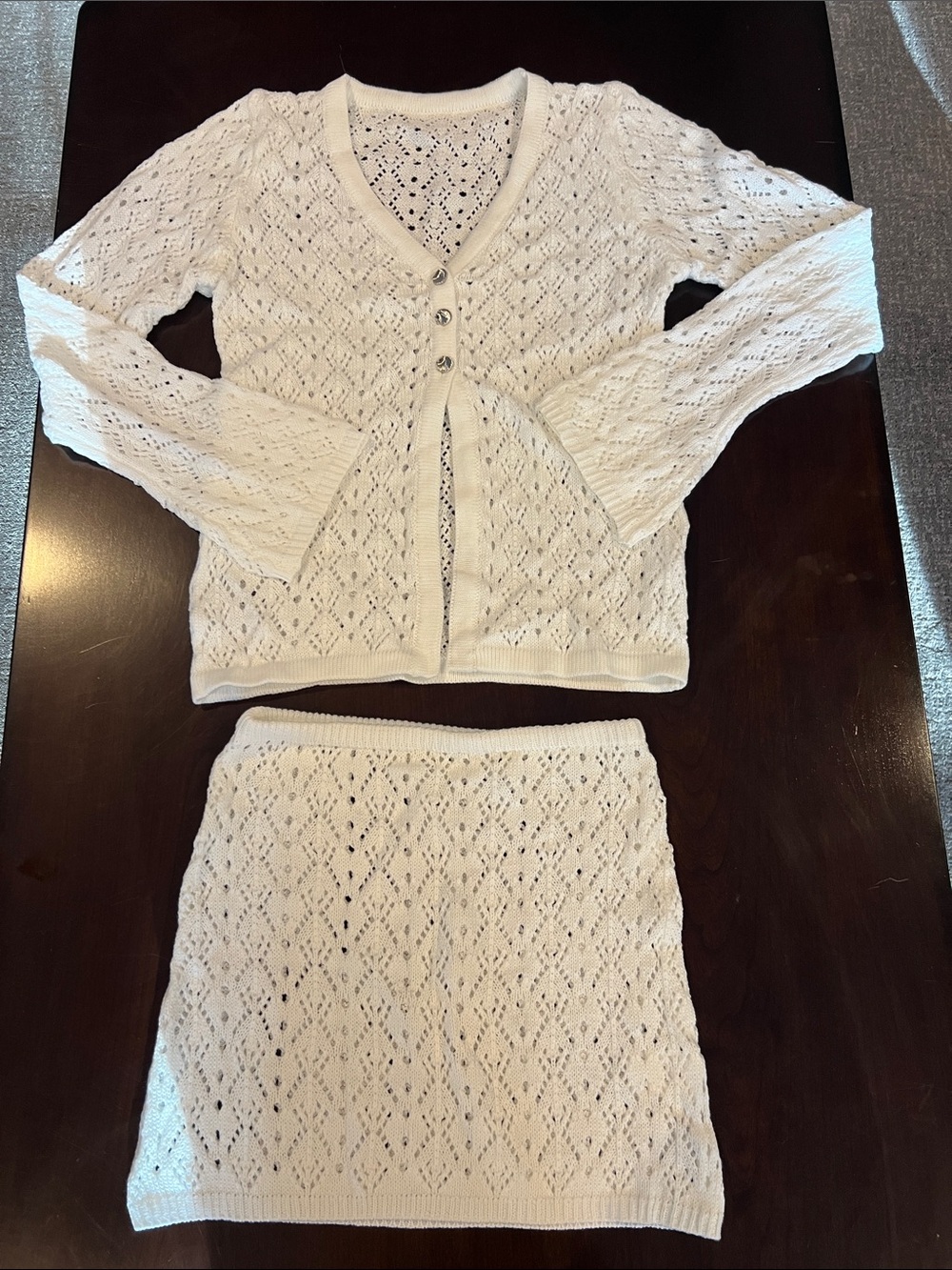 White Crochet Knit Mini Skirt and Cardigan Set with shell buttons on tops